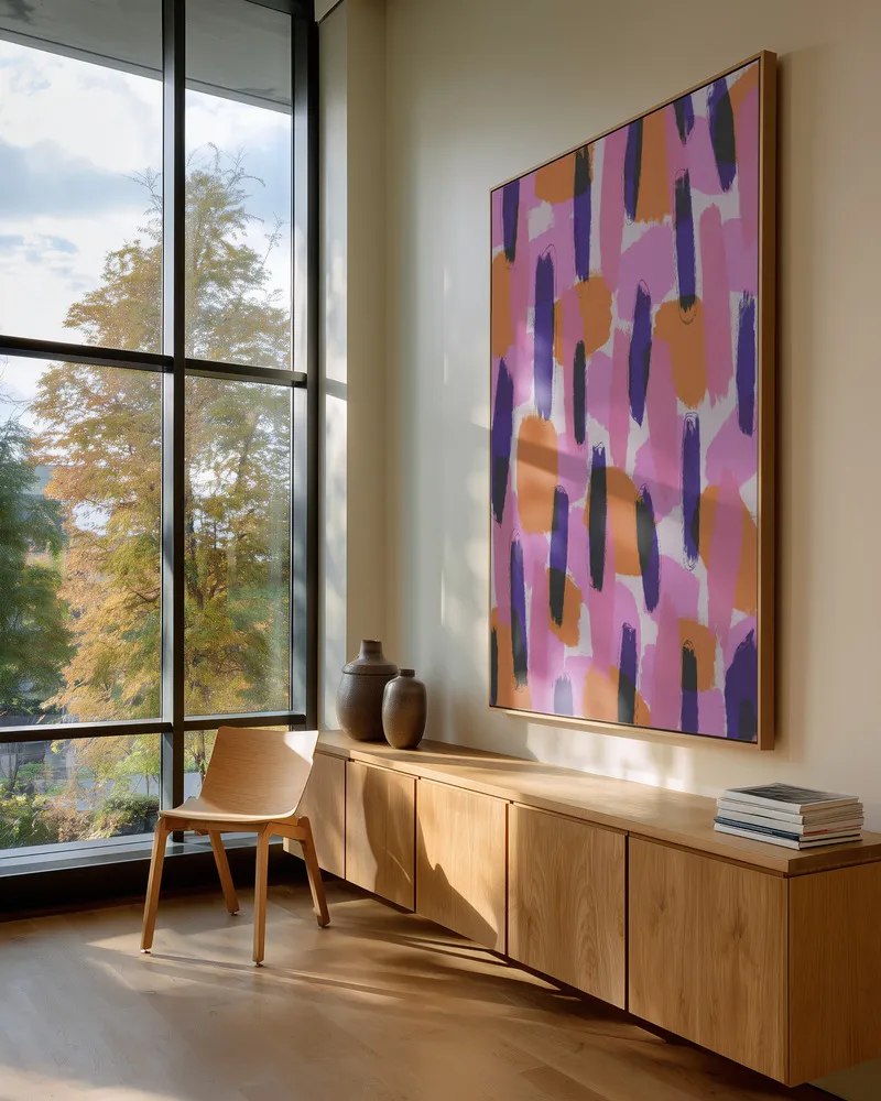 Abstractes landschaftsmotiv in pink und orange in interieur